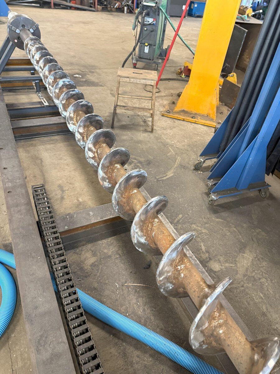 Hardfacing on auger and wear component
